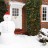snowman-outside-house-48×48