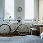 48292412 – trendy white city bicycle in bright bedroom